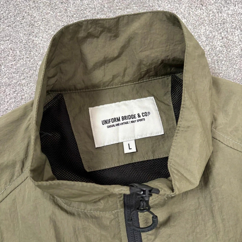 Uniform Bridge Boxy Nylon Track Jacket Olive L